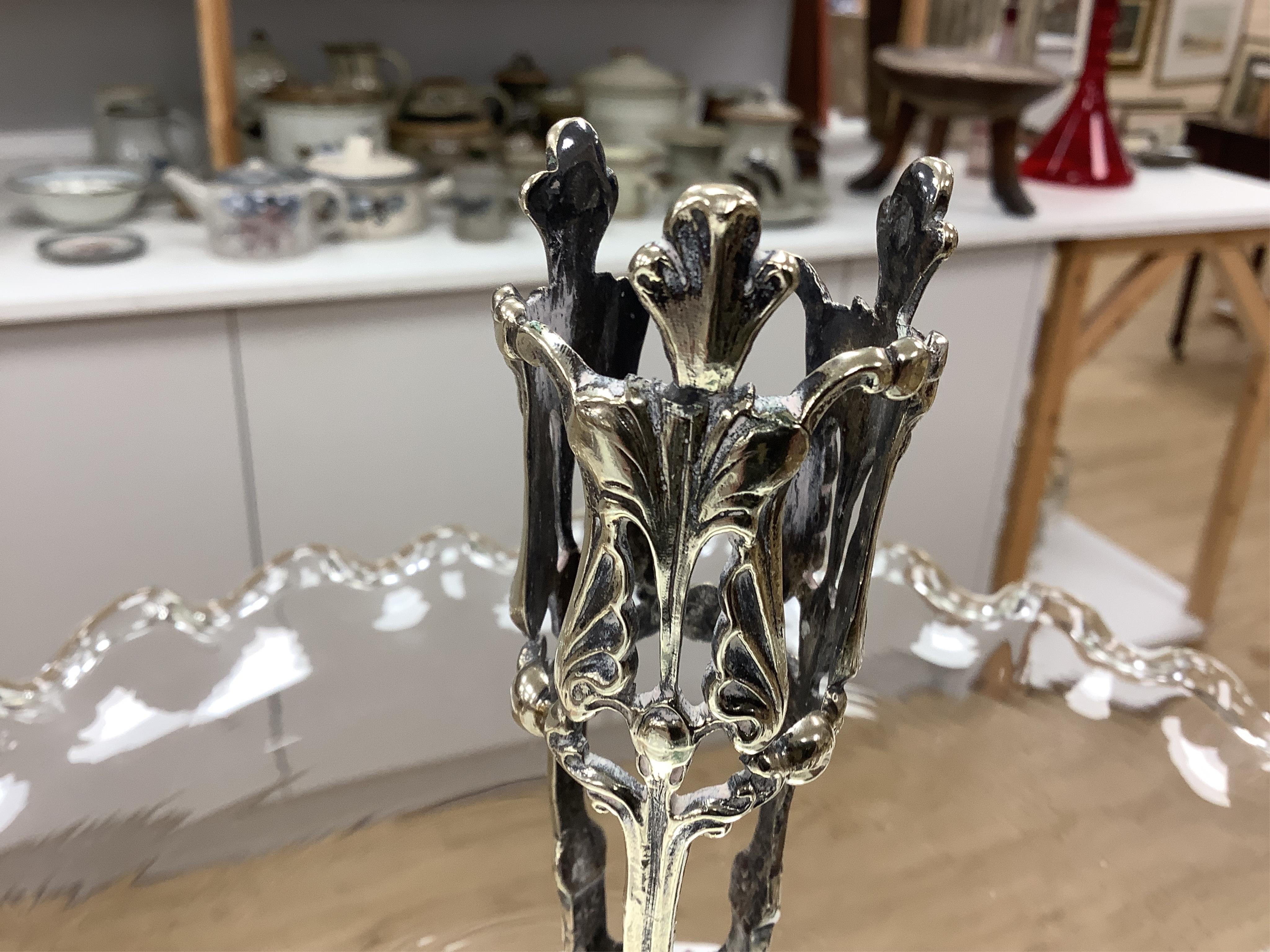 A glass and plated epergne, 47cm high, and five plated wares including three wine coasters, and two salts. Condition - fair to good